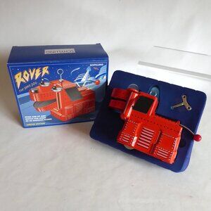 VINTAGE NEW ROVER SPACE DOG SCHYLLING WIND UP COLLECTIBLE TIN TOY